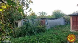 Півбудинку в Шамраівці.27 соток.Фундамент під новий будинок.