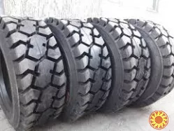 Шини на навантажувачі Bobcat, Сase, Komatsu, CAT, UNC-locust, Gehl, Mustang, Sunward, JCB, ін.