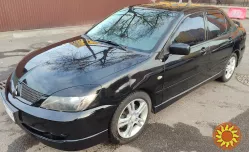 Аренда авто с правом выкупа Мицубиси Лансер СПОРТ Киев без залога