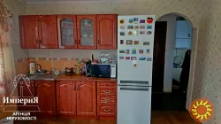 Продам кирпичный дом с ремонтом и всеми коммуникациями.