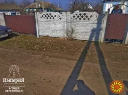 Продам дом в Чепилиевке.25 соток.Газ,свет,вода.