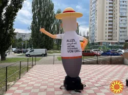 Зовнішня реклама для ресторану надувний чоловічок
