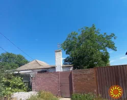 Продам дом в городе на берегу реки