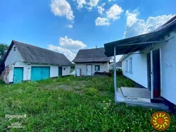 Продам дом в Центре села Тушки.Все коммуникации.