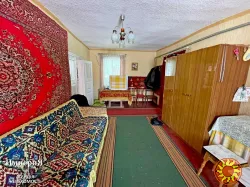 Дом с коммуникациями возле озера в Быковой Гребле.