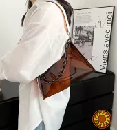 Сумочка прозора шоколадного кольору