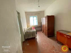 Продам кирпичный дом в Центре села Великополовецкое.Участок 65 соток.