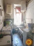 Продам комнату в коммуне в районе НОВОГО рынка на ул.Нежинской.