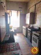 Продам комнату в коммуне в районе НОВОГО рынка на ул.Нежинской.