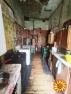 Продам комнату в коммуне в районе НОВОГО рынка на ул.Нежинской.