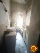 Продам комнату в коммуне в районе НОВОГО рынка на ул.Нежинской.